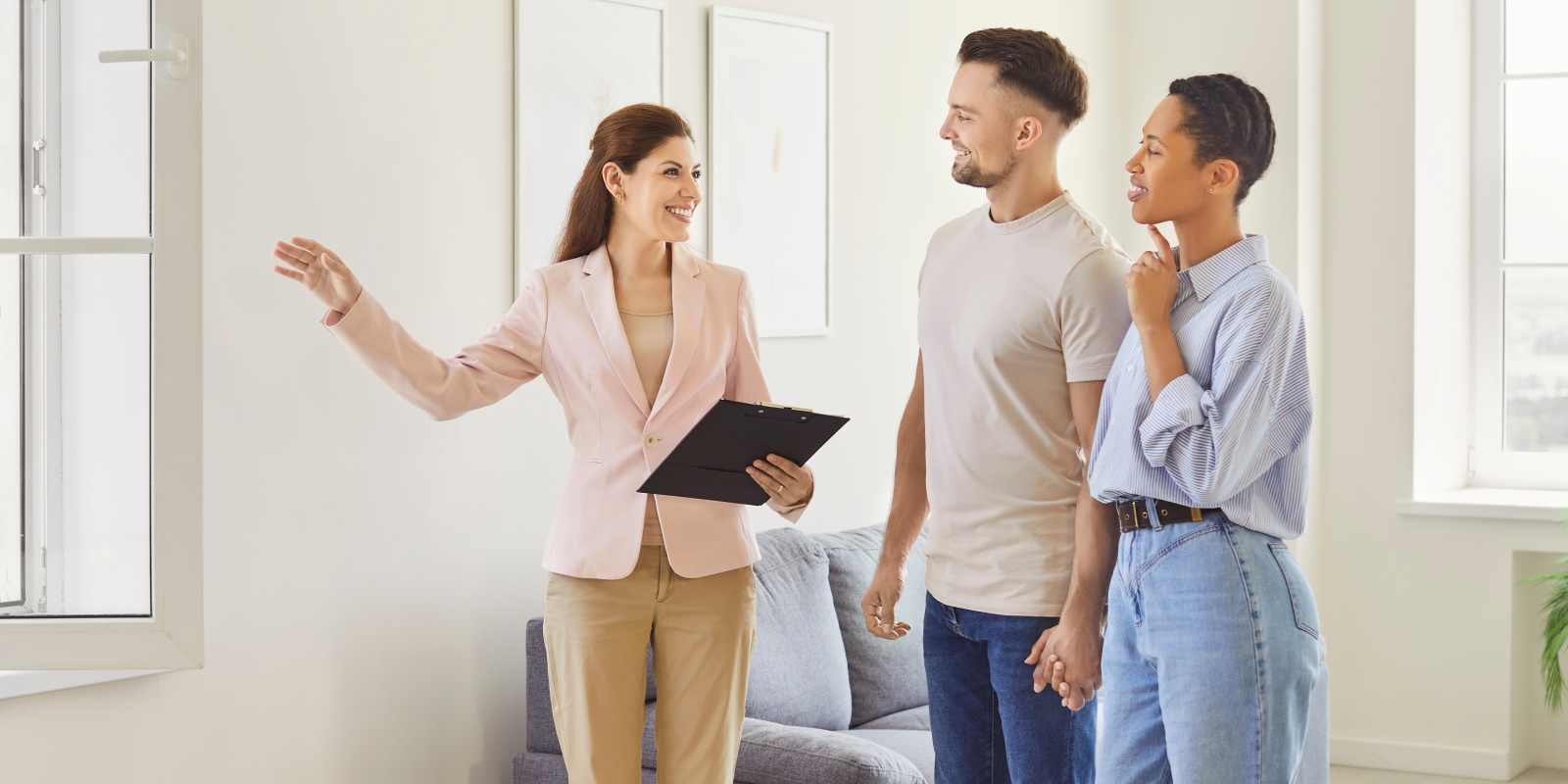 Female Apartment Leasing Support Showing House to A Couple